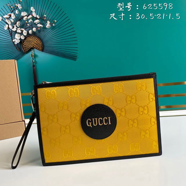 Gucci古馳包包 G家新款手包 625598 古奇黃布/克皮男士手拿包 gdj1404